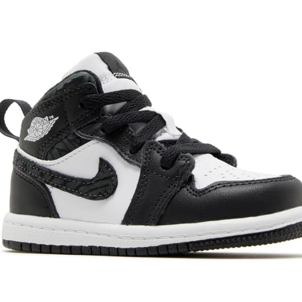 Jordan Black and White Retro High-Top Sneakers